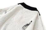 Bangchan Distressed V-Neck Sweater